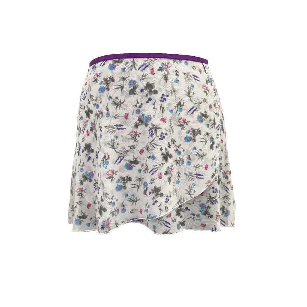 Falda corta blanco flores moradas niña