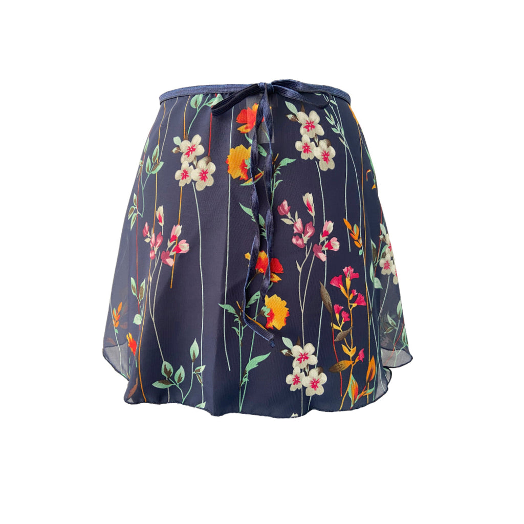 Falda corta flores lineal azul oscuro niña