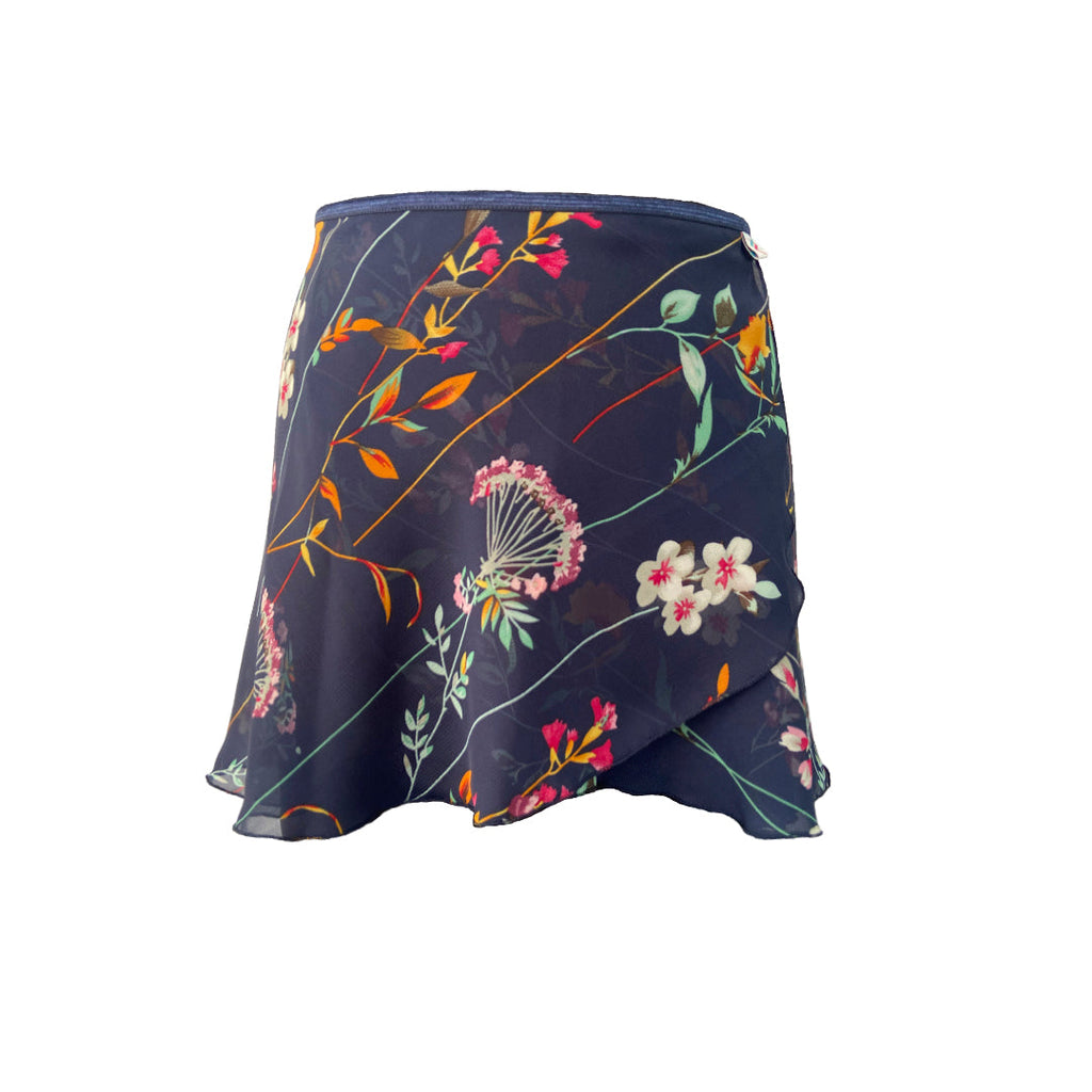 Falda corta flores lineal azul oscuro niña