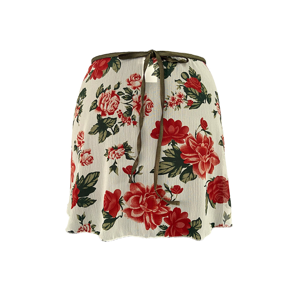 Falda corta blanca con rosas rojas niña