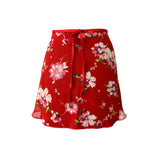 Falda corta flores roja niña