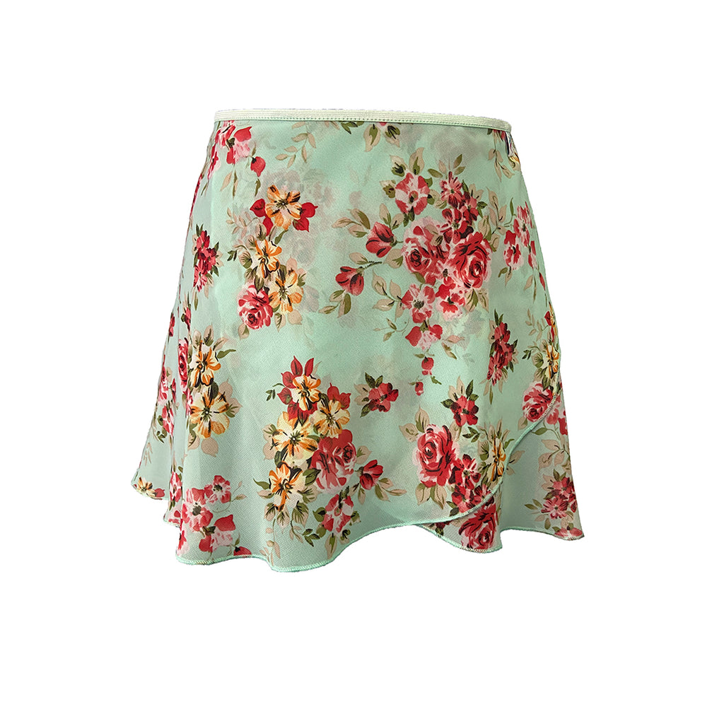 Falda corta flores menta niña
