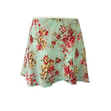 Falda corta flores menta niña