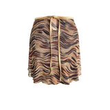 Falda corta animal print arena